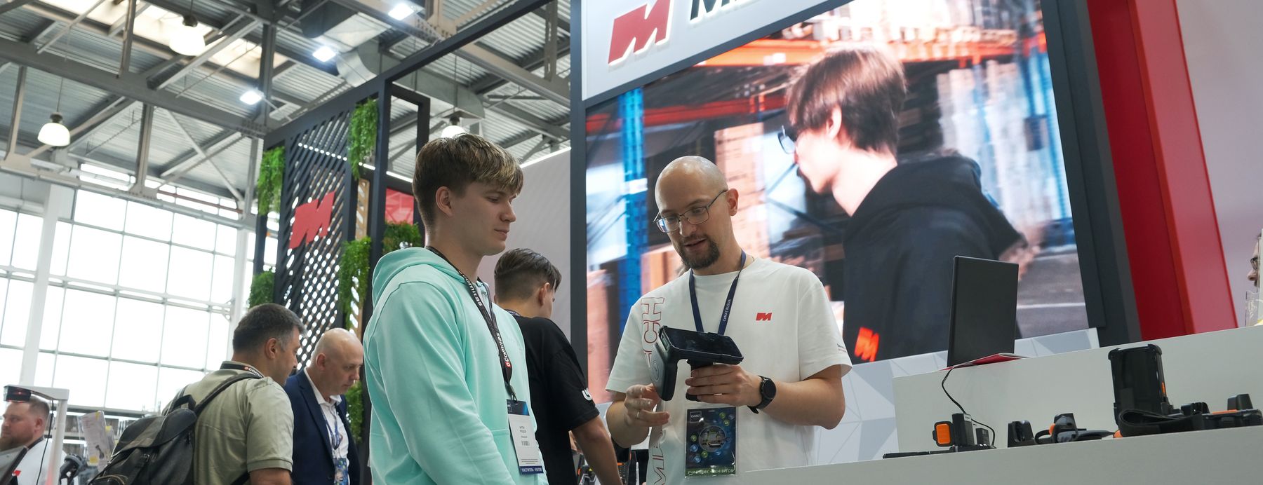 MERTECH team at the company booth